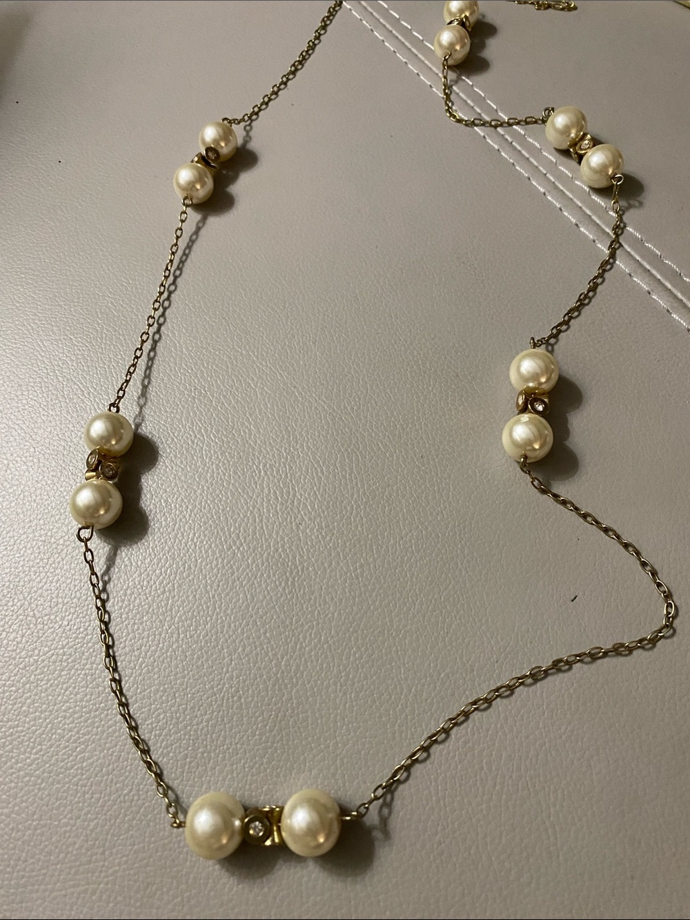 J Crew 39” gold and faux pearl necklace.